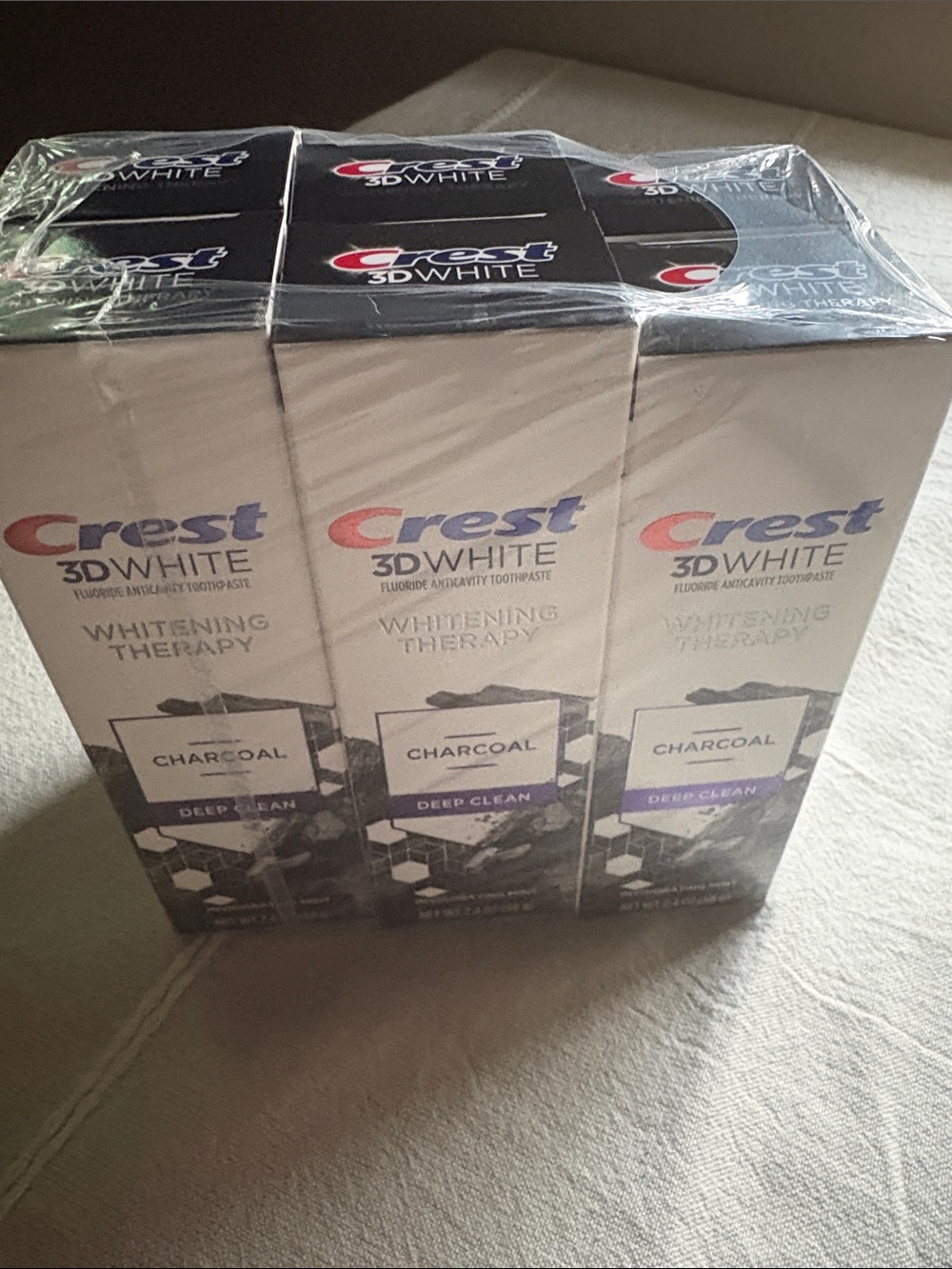 6 count of whitening Toothpaste (Crest 3D White) charcoal deep clean 2.4oz each